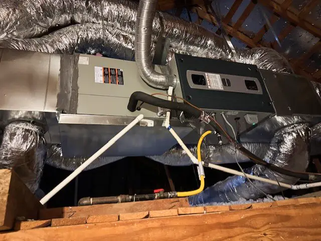 An attic installation of an air handler.